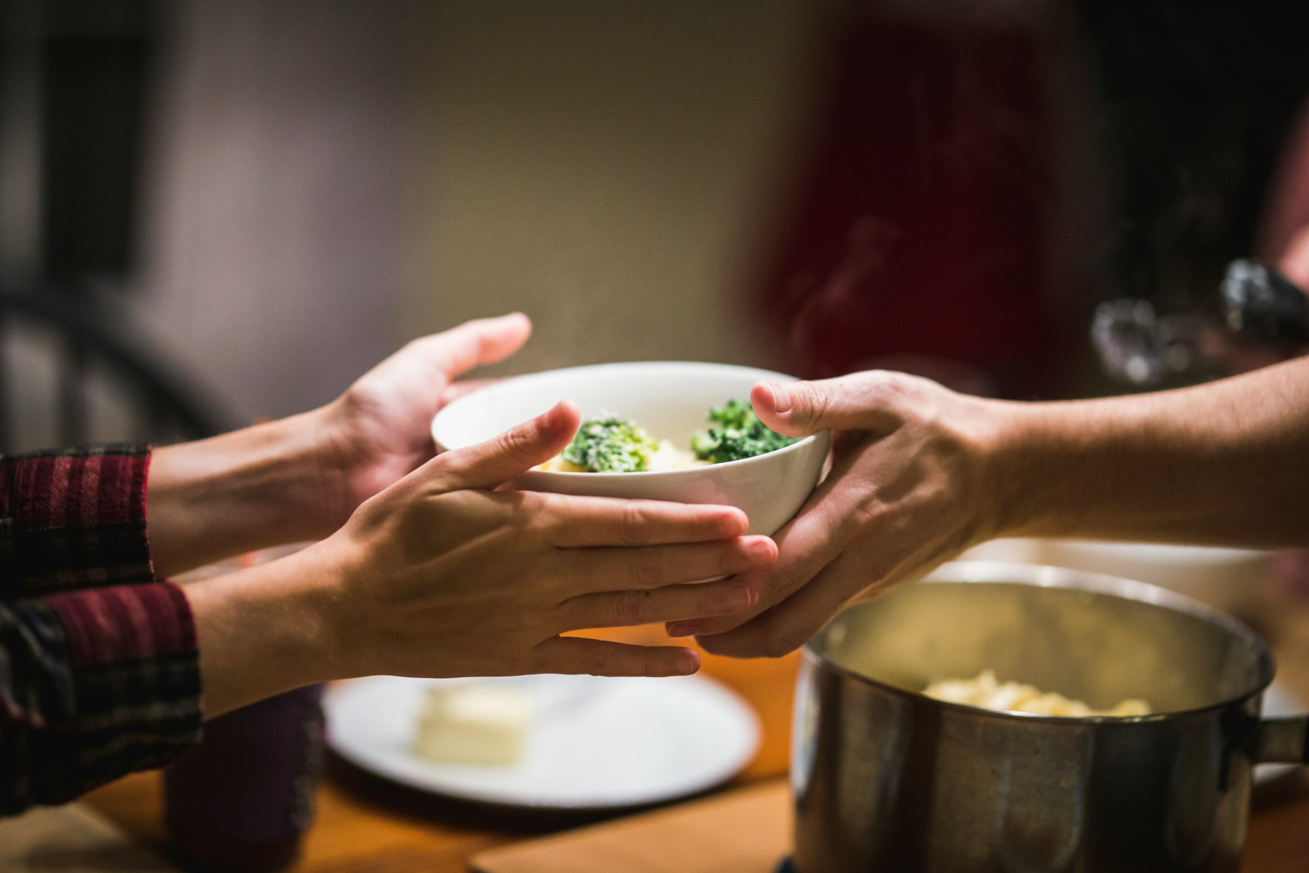 Hands serving food